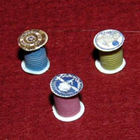 1 inch scale: spools of thread