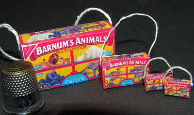 Miniature animal cracker purse boxes in many doll scales